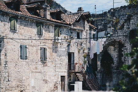 Clothes drying after laundry in old ruined house. Croatia