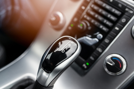 Close-up on automatic transmission lever in modern car