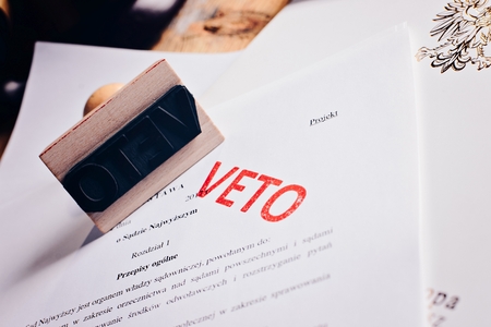 Polish law act with red veto stamp. President vetoの写真素材