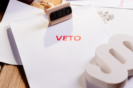 Law act with red veto stamp. President vetoの写真素材