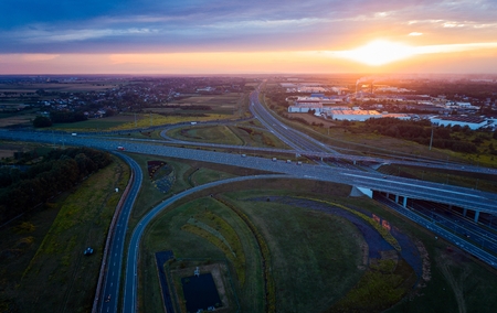 Sunset over the highway junction and industrial zone. Gliwice, Silesia, Polandの写真素材