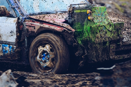 Wreck car dirt race on muddy trackの写真素材