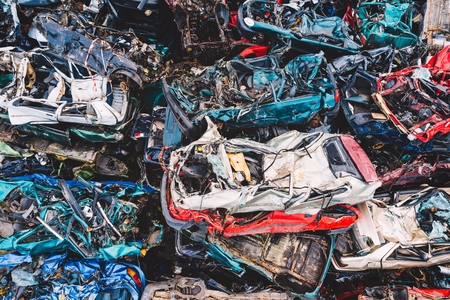 Scrapped cars stacked on a scrap yard. Car recyclingの写真素材