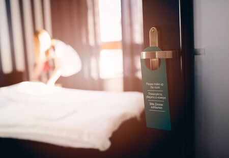 Multilingual hotel door hanger. Please clean my roomの写真素材