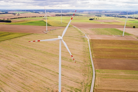 Aerial drone view on wind electricity generator. Green renewable energyの写真素材