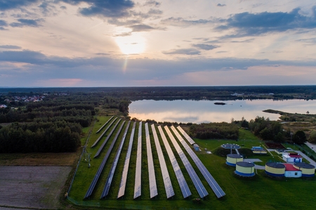 Aerial drone view on solar panels in green renewable energy solar farmの写真素材