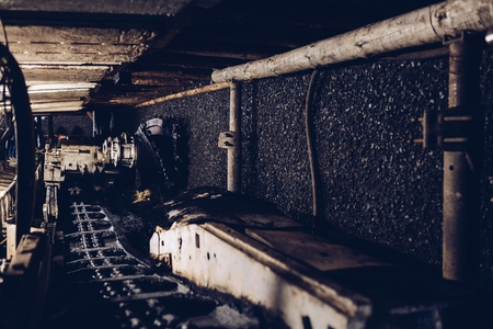 Black coal shearer in underground coal mineの写真素材