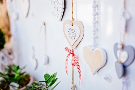 White wooden hearts - decorations in flower shopの写真素材