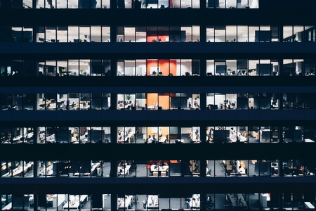 Office building at night. Late night overtimeの写真素材