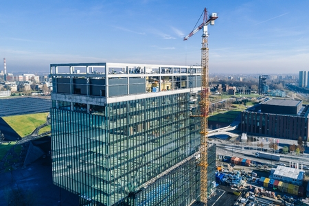 Skyscraper construction with working crane in Katowice, Silesia, Polandの写真素材