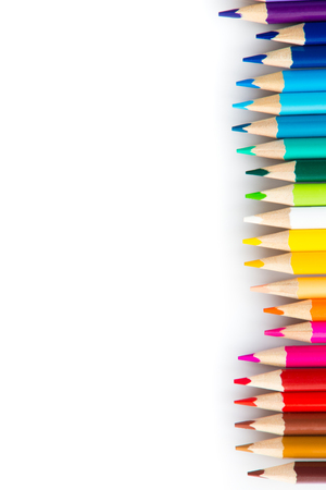 Wooden coloured pencils in row isolated on white background. Copyspaceの写真素材