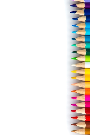 Wooden coloured pencils in row isolated on white background. Copyspaceの写真素材