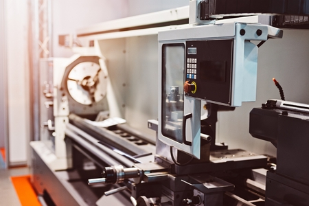 Digitally controlled modern cnc lathe in a factoryの写真素材