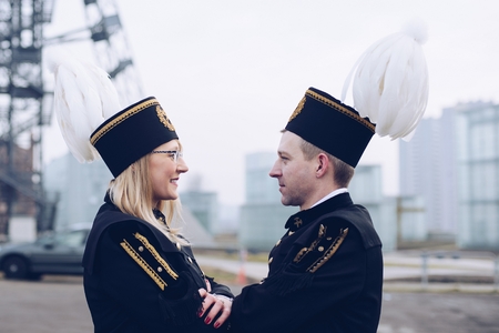Polish black coal miners family in gala uniforms. Working familyの写真素材
