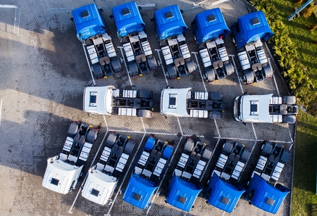 Aerial drone view of parked trucks. Road transportの写真素材