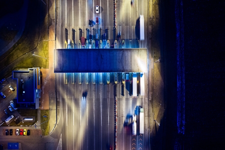 Aerial drone view on toll collection point on motorway at night. Pay road, Gliwice, Polandの写真素材