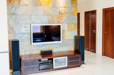 TV set with Hi-fi home cinema system. TV on the wall.の写真素材