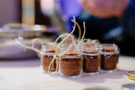 Aromatic mexican spice in little jars in kitchenの写真素材