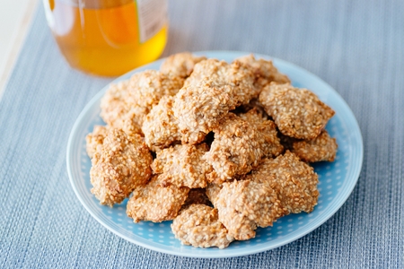 Delicious homemade sesame honey cookies on plateの写真素材