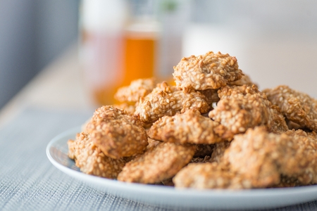 Delicious homemade sesame honey cookies on plateの写真素材