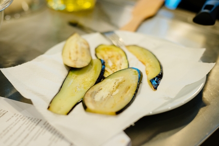 Fried eggplant on the kitchen towel in the kitchenの写真素材