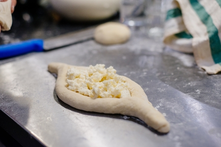 Raw traditional khachapuri. Georgian cheese bread. Georgian foodの写真素材