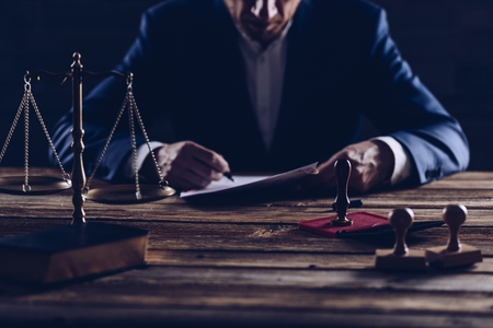 Notary public notarizes document in his office. Law conceptの写真素材