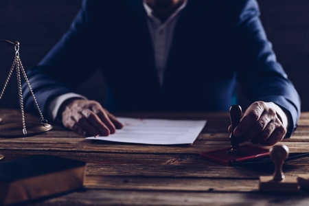 Notary public or judge reading testament. Law conceptの写真素材