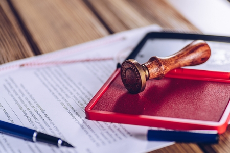 Red ink stamp on the document. Law conceptの写真素材