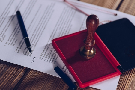 Red ink stamp on the document. Law conceptの写真素材