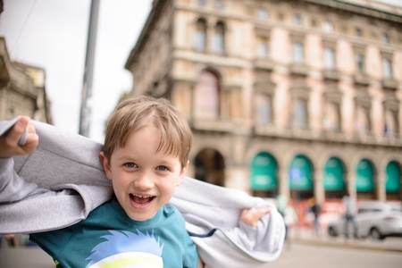 Very happy child boy at old town. Child on vacationsの写真素材