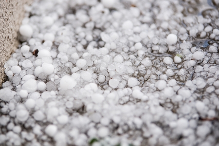 Large hail ice balls after heavy summer stormの写真素材