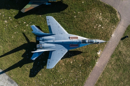 Aerial drone view on military airbase with old Russian jet fighters. Airplanes cemeteryのeditorial素材