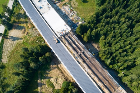 Aerial drone view on road under construction. Construction of the viaduct on the national road number 7 in Polandの写真素材