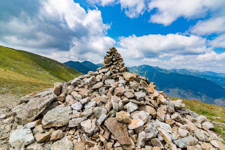 Mound of stones on mountain trail. Polish Tatra mountains. Zakopane, Polandの写真素材