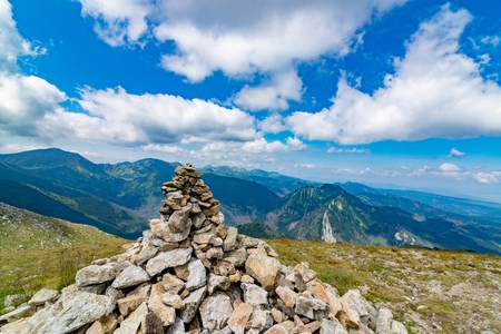 Mound of stones on mountain trail. Polish Tatra mountains. Zakopane, Polandの写真素材