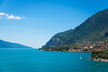 Beauty summer view on Limone sul Garda and Garda Lake and mountains, Lombardy, Italyの写真素材