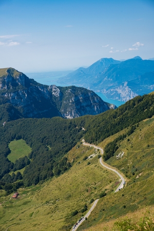 Mountain road and trail to Monte Altissimo in Italian Alpsの写真素材