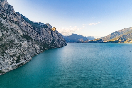 Aerial drone view of road and tunnels over Lake Garda in Italy, Limone sul Gardaの写真素材