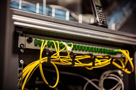 Network server and internet wires. Internet network routers. Wires connected to network interfaces. Internet serverの写真素材