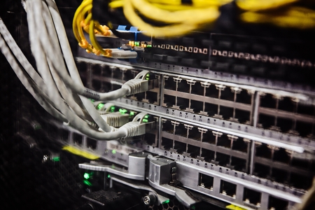 Internet routers and wires in Internet service provider. Internet cables in Data Centerの写真素材
