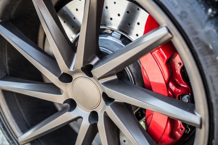 Sports car braking system. Disc brake and brake caliperの写真素材