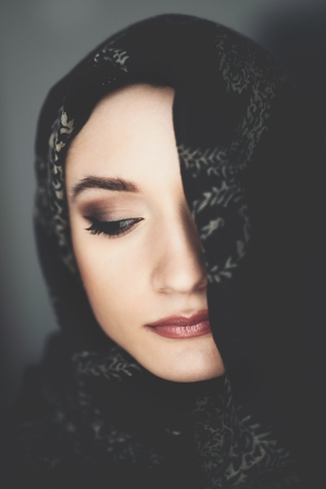 Young beautiful middle eastern ethnicity woman wearing a hijabの写真素材