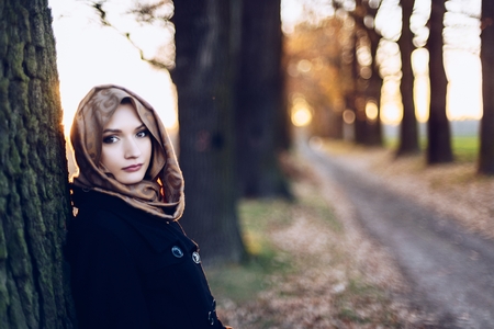 Young sad arabic woman in hijab outdoorsの写真素材