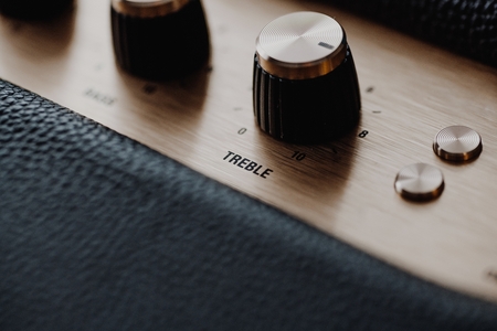 Treble control knob on music amplifier equalizerの写真素材