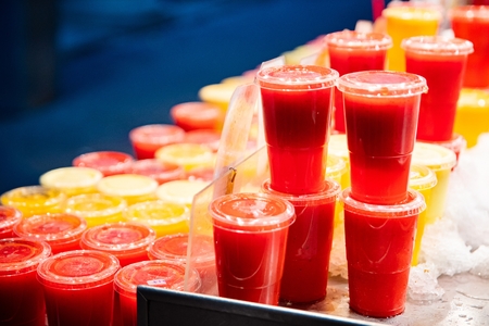 Fresh smoothies in plastic cups for take away. Healthy lunchの写真素材
