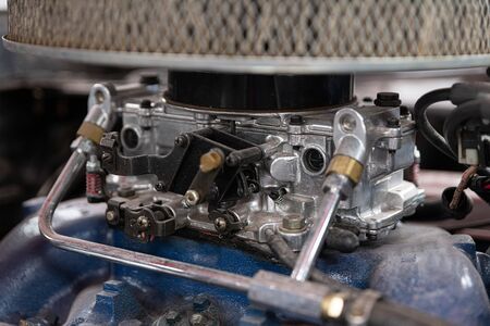 Carburetor and air filter in classing v8 engineの写真素材