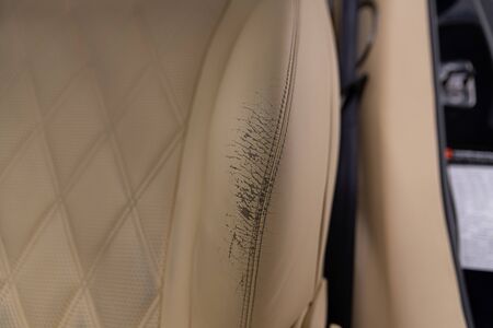 Damaged modern car leather seat. Car renovationの写真素材