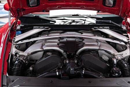 Powerful twelve cylinder engine mounted in coupe sports car.の写真素材