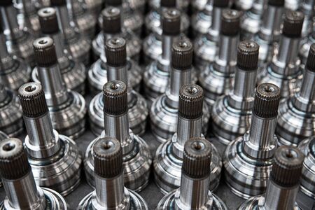 Machine parts. Axles on a factory stackの写真素材